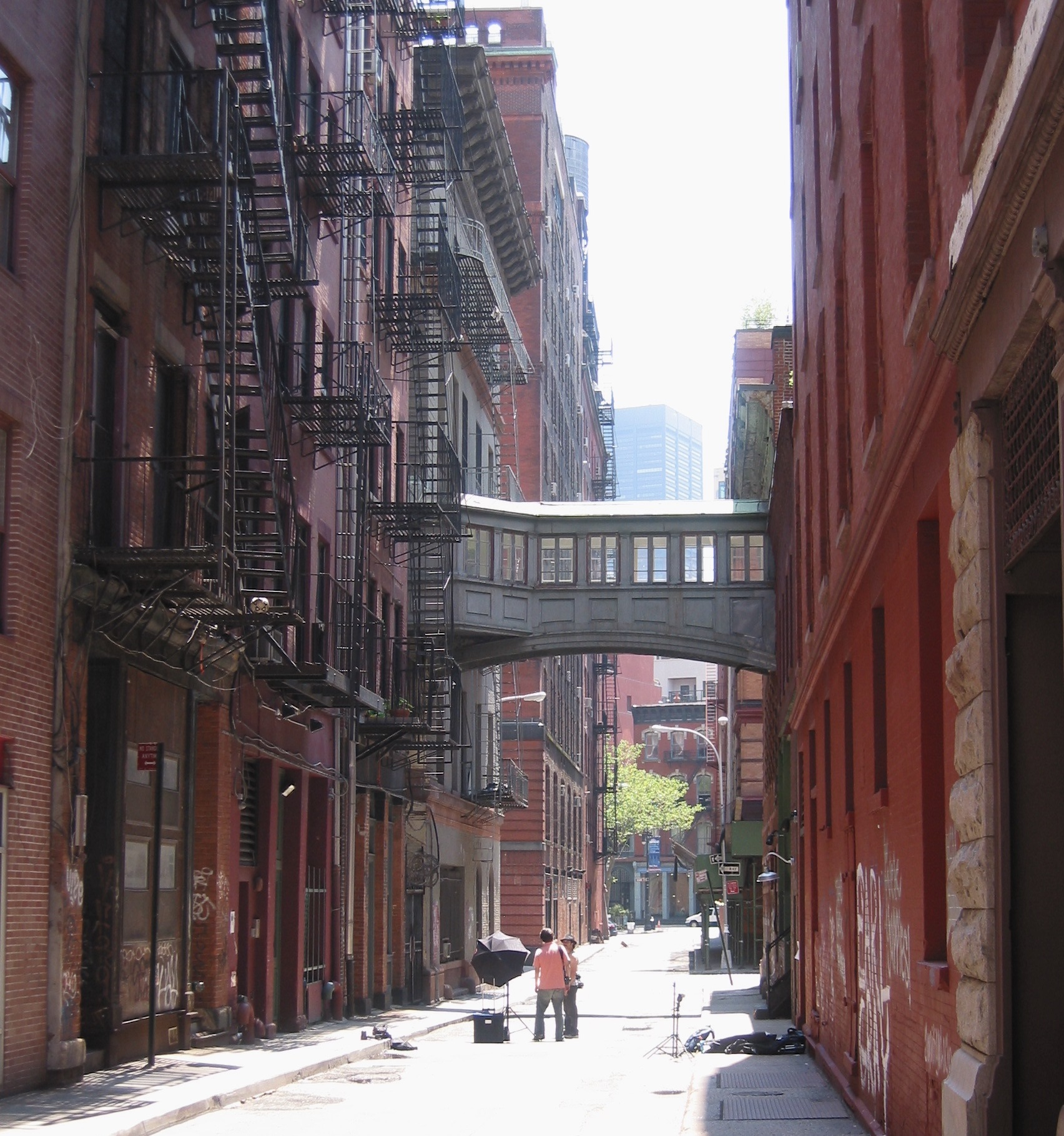 Two people in the middle of a street in Tribeca, NYC